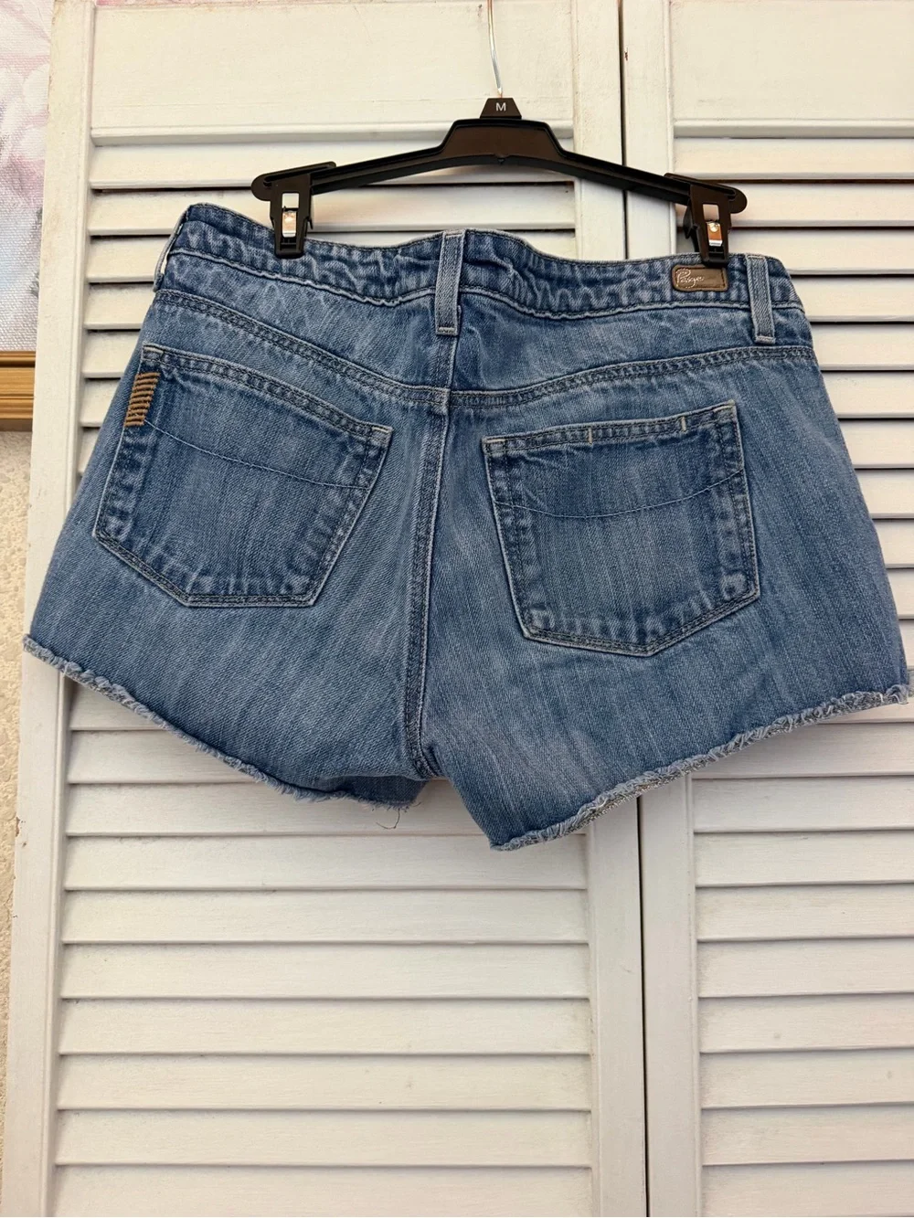 Paige Premium Denim Light Blue Distressed Denim Cutoff Shorts